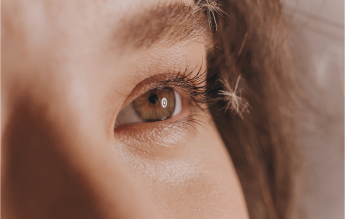 A close-up image of a woman's eye
